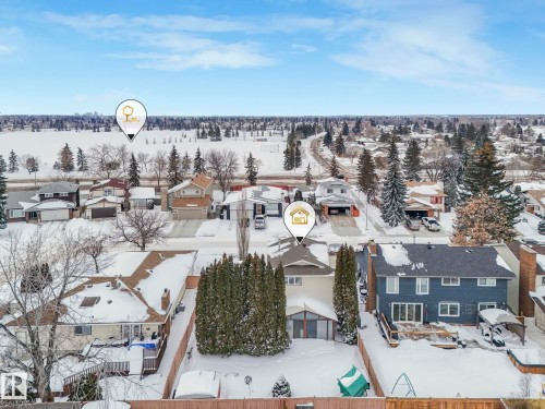 Snowy aerial view with a residential view - 15909 112 B Street Nw, Edmonton, AB - Outdoor With View