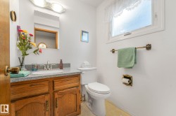 Bathroom featuring vanity and toilet - 