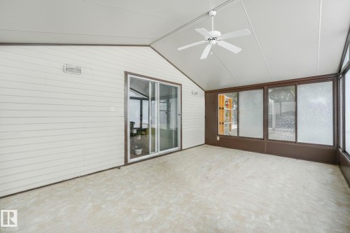 Unfurnished sunroom featuring a ceiling fan - 15909 112 B Street Nw, Edmonton, AB - Indoor Photo Showing Other Room