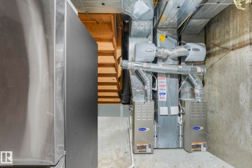 Utility room with heating unit - 15909 112 B Street Nw, Edmonton, AB - Indoor Photo Showing Basement