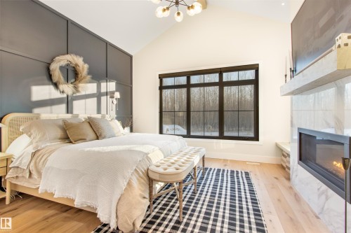 49213 Range Road 82, Rural Brazeau County, AB - Indoor Photo Showing Bedroom With Fireplace