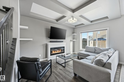 16813 65 Street, Edmonton, AB - Indoor Photo Showing Living Room With Fireplace
