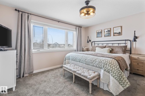 Bedroom with carpet - 10415 94 Street, Morinville, AB - Indoor Photo Showing Bedroom