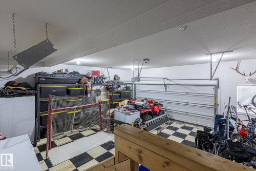 View of garage - 10415 94 Street, Morinville, AB - Indoor Photo Showing Garage