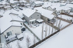 Snowy aerial view with a residential view - 