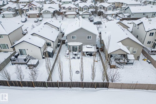 Snowy aerial view with a residential view - 10415 94 Street, Morinville, AB - Outdoor