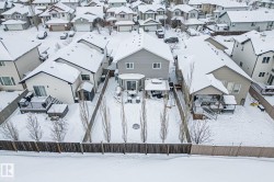 Snowy aerial view with a residential view - 