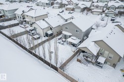 Snowy aerial view with a residential view - 