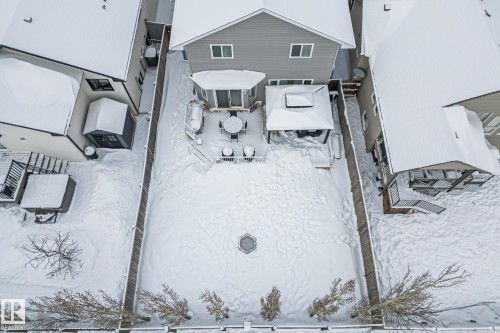 Snowy aerial view with a residential view - 10415 94 Street, Morinville, AB - Outdoor