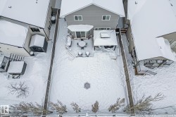 Snowy aerial view with a residential view - 
