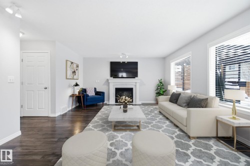 5302 57 Avenue, Stony Plain, AB - Indoor Photo Showing Living Room With Fireplace
