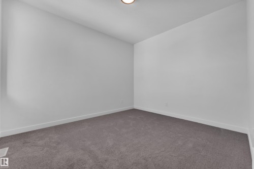 Empty room with carpet floors and baseboards - 95 Eldridge Point(E), St. Albert, AB - Indoor Photo Showing Other Room
