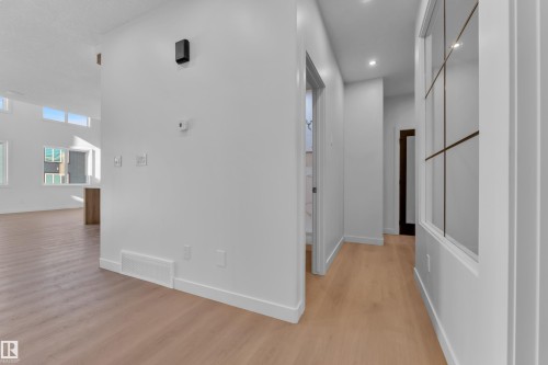 Corridor featuring light wood-style flooring and recessed lighting - 95 Eldridge Point(E), St. Albert, AB - Indoor Photo Showing Other Room
