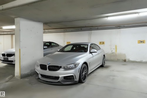 408 10179 105 Street, Edmonton, AB - Indoor Photo Showing Garage