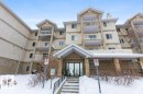 Snow covered property with a view of apartment building / complex - 403 14708 50 Street, Edmonton, AB  - Outdoor With Balcony With Facade 