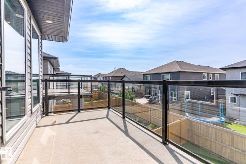 Balcony featuring a residential view - 1027 150 Avenue, Edmonton, AB - Outdoor With Balcony With Exterior