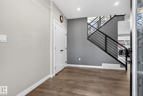 Entryway with dark wood-style floors, ceiling fan, and recessed lighting - 1027 150 Avenue, Edmonton, AB - Indoor Photo Showing Other Room