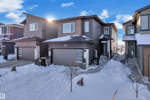 Modern home featuring an attached garage - 316 42 Street, Edmonton, AB - Outdoor With Facade
