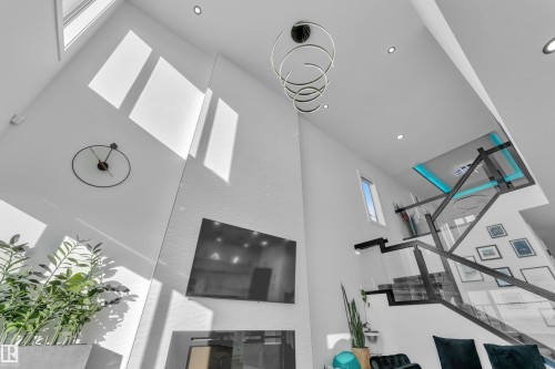 Detailed view of a skylight, a glass covered fireplace, and recessed lighting - 316 42 Street, Edmonton, AB -  Photo Showing Other Room