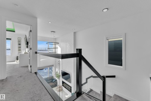 Staircase with carpet floors and recessed lighting - 316 42 Street, Edmonton, AB - Indoor Photo Showing Other Room