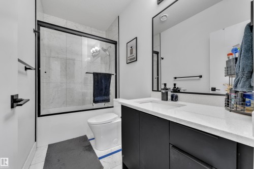 Full bath with vanity and enclosed tub / shower combo - 316 42 Street, Edmonton, AB - Indoor Photo Showing Bathroom