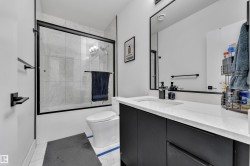 Full bath with vanity and enclosed tub / shower combo - 