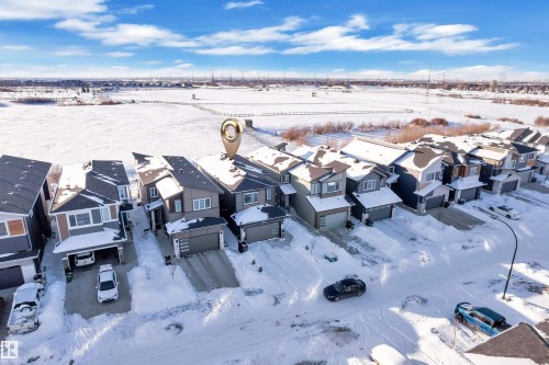 Snowy aerial view featuring a residential view - 316 42 Street, Edmonton, AB - Outdoor With View