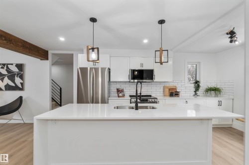 6719 95 Avenue, Edmonton, AB - Indoor Photo Showing Kitchen With Double Sink With Upgraded Kitchen
