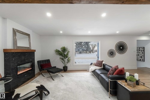 6719 95 Avenue, Edmonton, AB - Indoor Photo Showing Living Room With Fireplace