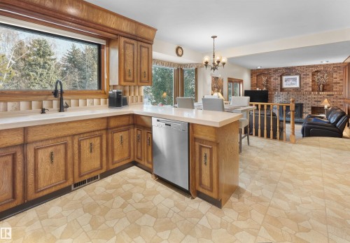 10908 Bearspaw Drive W, Edmonton, AB - Indoor Photo Showing Kitchen With Double Sink