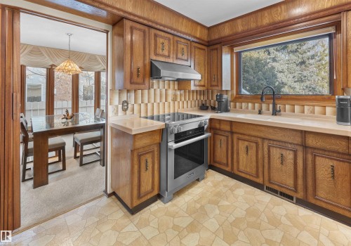 10908 Bearspaw Drive W, Edmonton, AB - Indoor Photo Showing Kitchen With Double Sink