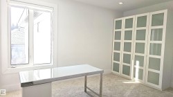 Unfurnished office with light carpet and recessed lighting - 