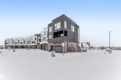 Snow covered building with a residential view - 