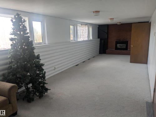 8311 96 Street, Edmonton, AB - Indoor With Fireplace