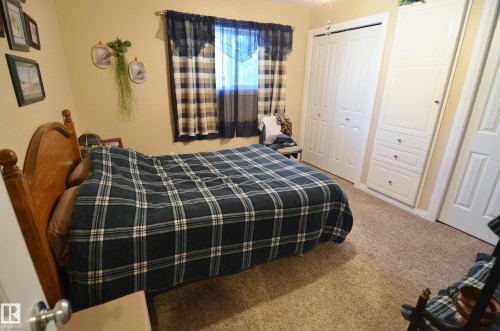 59225 Rge Rd 31, Rural Barrhead County, AB - Indoor Photo Showing Bedroom