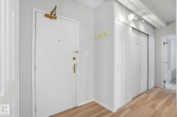 Entryway featuring light wood-style flooring and baseboards - 