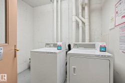 Shared laundry featuring separate washer and dryer - 