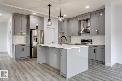 35 Caledon Crescent, Spruce Grove, AB - Indoor Photo Showing Kitchen With Stainless Steel Kitchen With Upgraded Kitchen