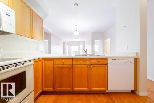 303 4304 139 Avenue, Edmonton, AB - Indoor Photo Showing Kitchen With Double Sink