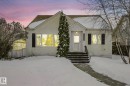 Bungalow with stucco siding and entry steps - 13911 117 Avenue, Edmonton, AB  - Outdoor With Facade 
