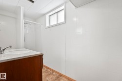 Full bath featuring a shower stall and vanity - 