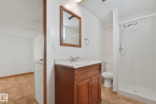 Full bathroom featuring vanity, a stall shower, and crown molding - 13911 117 Avenue, Edmonton, AB - Indoor Photo Showing Bathroom