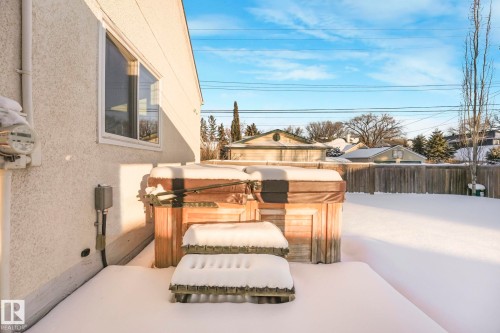View of patio with a hot tub - 13911 117 Avenue, Edmonton, AB - Outdoor