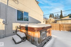 Exterior view of a jacuzzi and stucco siding - 