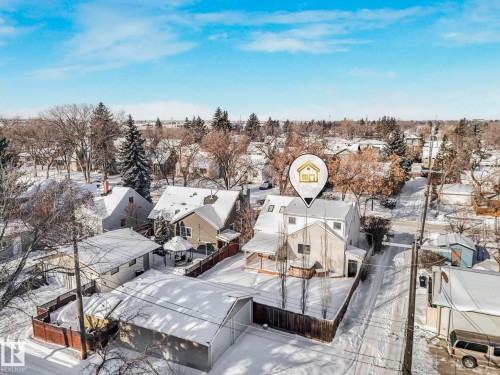 Snowy aerial view featuring a residential view - 13911 117 Avenue, Edmonton, AB - Outdoor With Deck Patio Veranda With View
