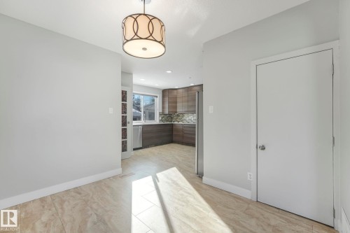 Interior space with baseboards - 13911 117 Avenue, Edmonton, AB - Indoor Photo Showing Other Room