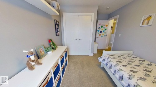 321 Pioneer Road, Spruce Grove, AB - Indoor Photo Showing Bedroom