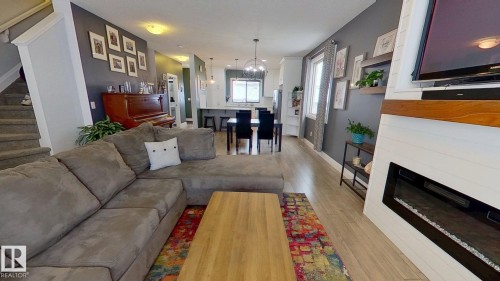 321 Pioneer Road, Spruce Grove, AB - Indoor Photo Showing Living Room With Fireplace