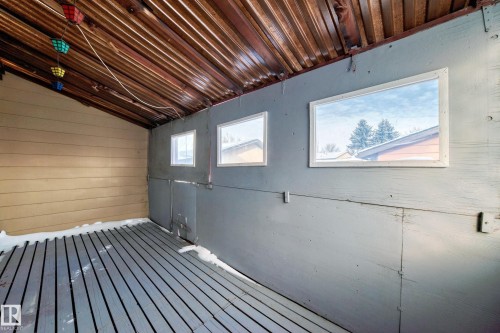 Basement featuring wooden walls - 11922 138 Avenue, Edmonton, AB - Indoor