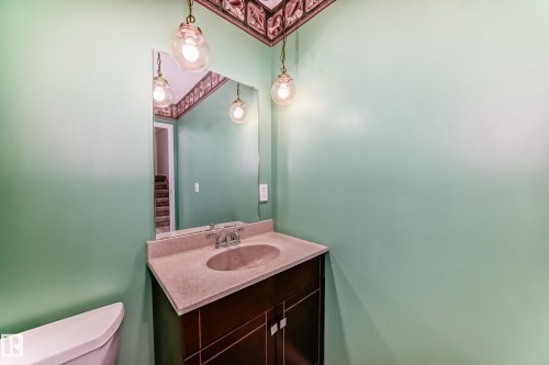 Bathroom with vanity and toilet - 11922 138 Avenue, Edmonton, AB - Indoor Photo Showing Bathroom